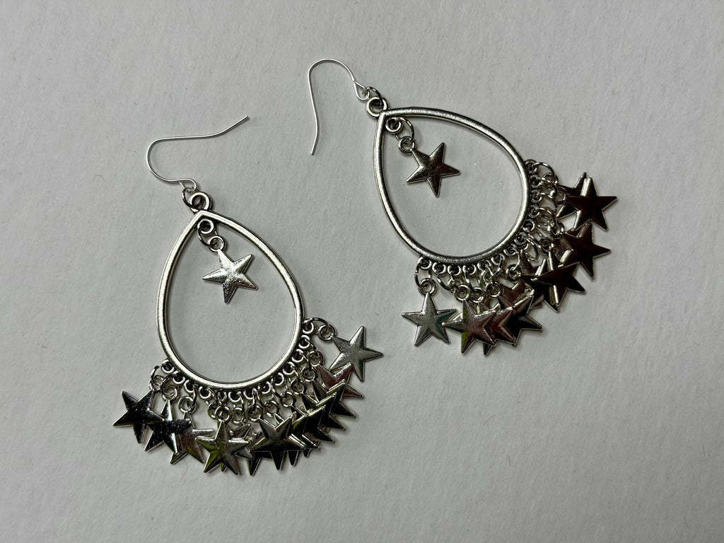 Huge star dangle earrings