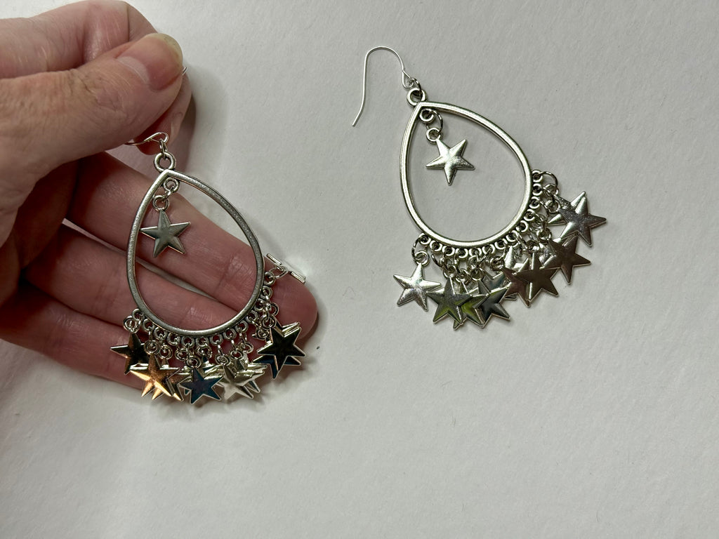 Huge star dangle earrings