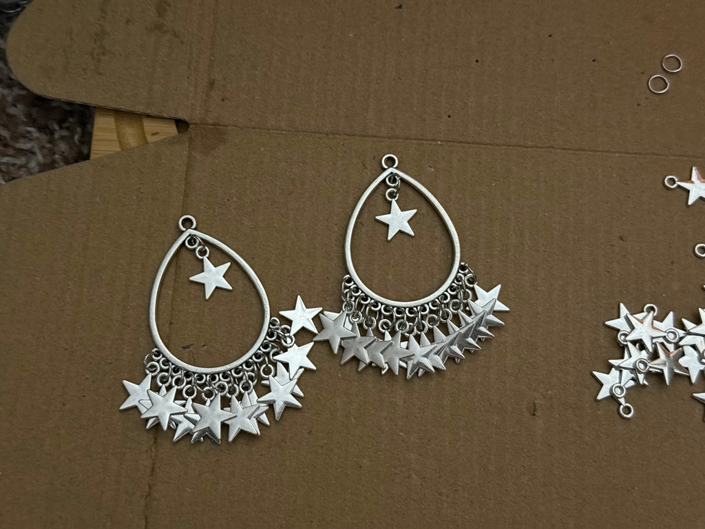 Huge star dangle earrings