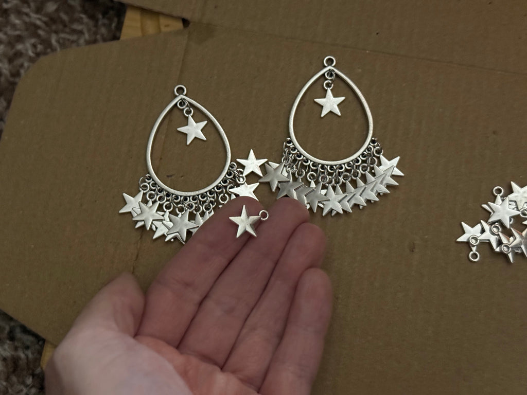 Huge star dangle earrings