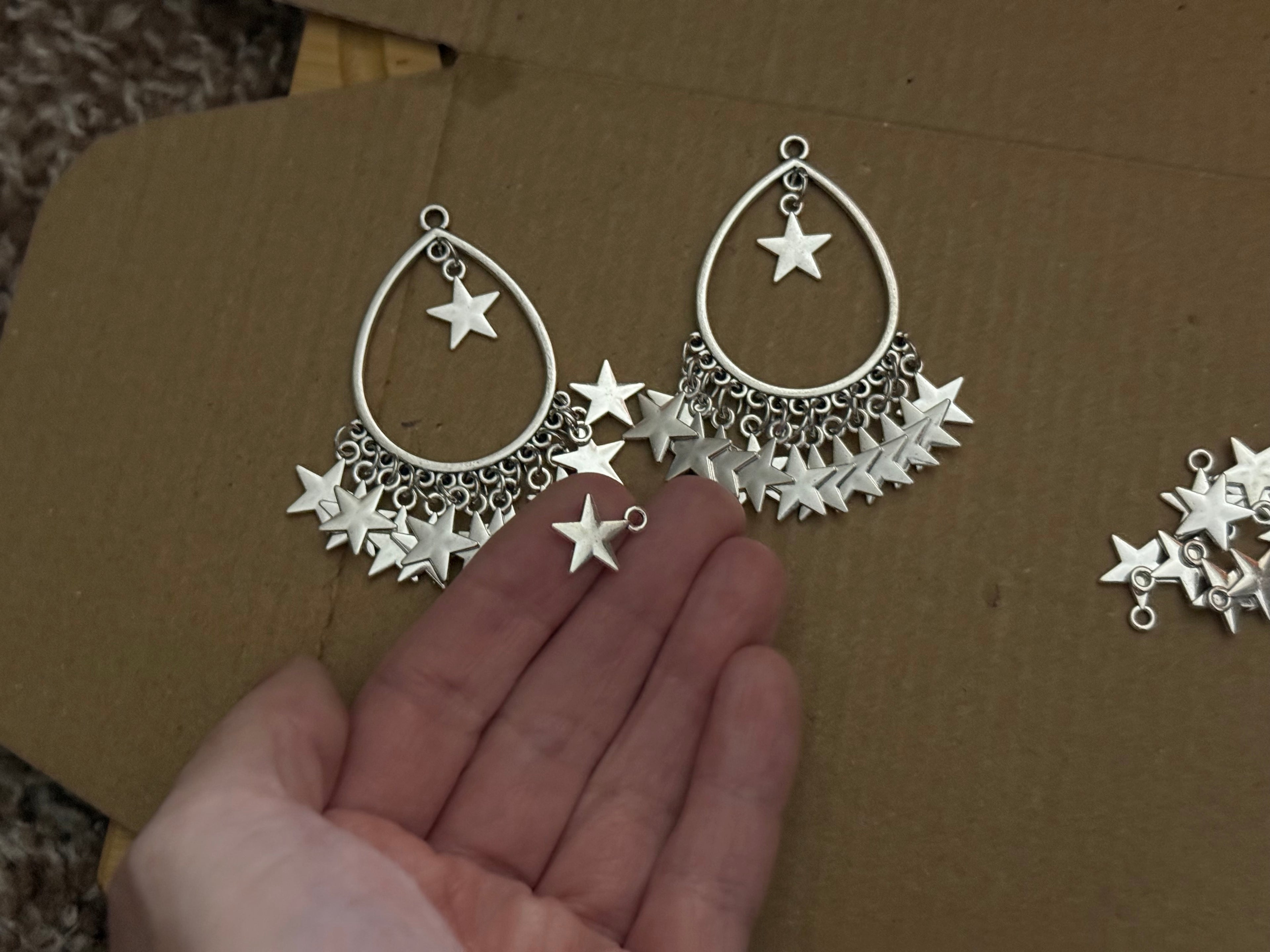 Huge star dangle earrings